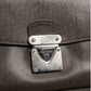 Louis Vuitton Belaia Clutch Taiga Leather